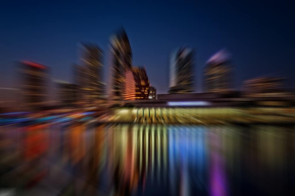 Blurry photo of downtown looking north from Bayshore across the water.